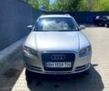 Серый Ауди А4, объемом двигателя 2 л и пробегом 400 тыс. км за 6500 $, фото 1 на Automoto.ua
