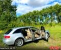 Сірий Ауді А4, об'ємом двигуна 2 л та пробігом 71 тис. км за 13900 $, фото 1 на Automoto.ua