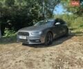 Сірий Ауді А4, об'ємом двигуна 2 л та пробігом 242 тис. км за 13488 $, фото 1 на Automoto.ua