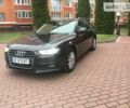 Сірий Ауді А4, об'ємом двигуна 2 л та пробігом 230 тис. км за 14499 $, фото 1 на Automoto.ua