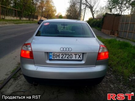 Серый Ауди А4, объемом двигателя 2 л и пробегом 242 тыс. км за 4700 $, фото 1 на Automoto.ua