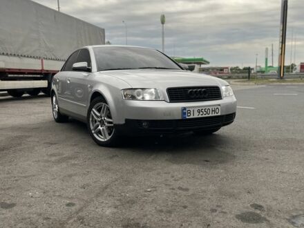 Сірий Ауді А4, об'ємом двигуна 2 л та пробігом 245 тис. км за 5600 $, фото 1 на Automoto.ua