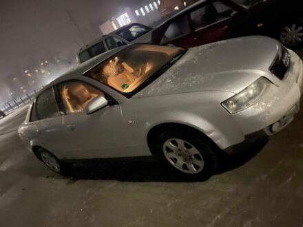 Серый Ауди А4, объемом двигателя 2 л и пробегом 306 тыс. км за 5000 $, фото 1 на Automoto.ua