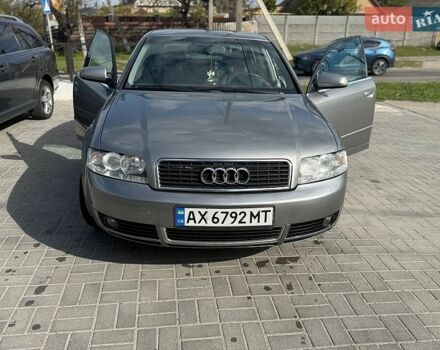 Серый Ауди А4, объемом двигателя 2 л и пробегом 301 тыс. км за 5000 $, фото 1 на Automoto.ua