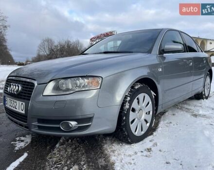 Сірий Ауді А4, об'ємом двигуна 2 л та пробігом 214 тис. км за 7300 $, фото 1 на Automoto.ua