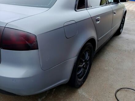 Серый Ауди А4, объемом двигателя 2 л и пробегом 300 тыс. км за 6700 $, фото 1 на Automoto.ua