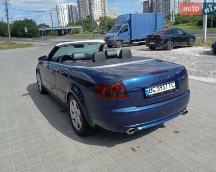 Синий Ауди А4, объемом двигателя 2.5 л и пробегом 249 тыс. км за 4899 $, фото 1 на Automoto.ua