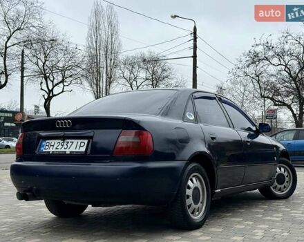 Синий Ауди А4, объемом двигателя 1.8 л и пробегом 321 тыс. км за 3400 $, фото 16 на Automoto.ua