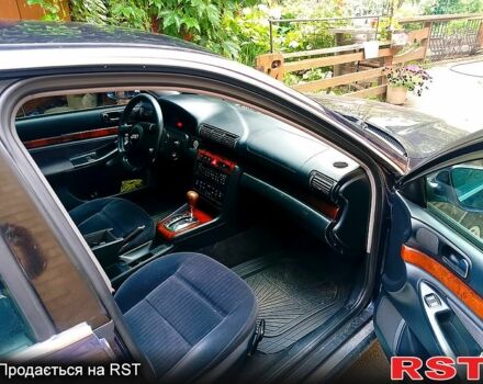 Синий Ауди А4, объемом двигателя 2.4 л и пробегом 323 тыс. км за 3300 $, фото 2 на Automoto.ua