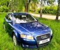 Синий Ауди А4, объемом двигателя 2 л и пробегом 237 тыс. км за 10999 $, фото 1 на Automoto.ua