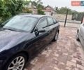 Синій Ауді А4, об'ємом двигуна 1.4 л та пробігом 246 тис. км за 18659 $, фото 3 на Automoto.ua