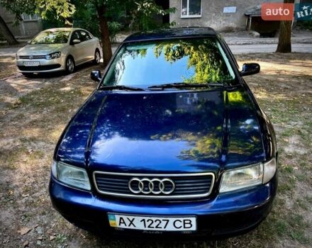 Синий Ауди А4, объемом двигателя 1.6 л и пробегом 260 тыс. км за 2300 $, фото 1 на Automoto.ua