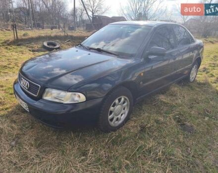 Синий Ауди А4, объемом двигателя 1.6 л и пробегом 260 тыс. км за 2390 $, фото 1 на Automoto.ua