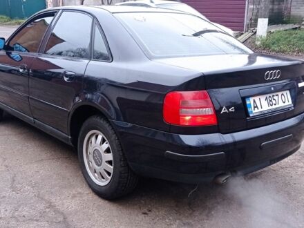 Синий Ауди А4, объемом двигателя 1.6 л и пробегом 200 тыс. км за 1650 $, фото 1 на Automoto.ua