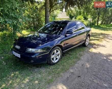Синий Ауди А4, объемом двигателя 1.6 л и пробегом 310 тыс. км за 4300 $, фото 1 на Automoto.ua