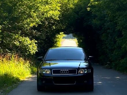 Синий Ауди А4, объемом двигателя 2 л и пробегом 306 тыс. км за 5300 $, фото 1 на Automoto.ua
