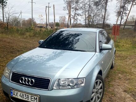 Синий Ауди А4, объемом двигателя 1.6 л и пробегом 230 тыс. км за 5700 $, фото 1 на Automoto.ua