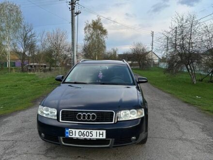Синий Ауди А4, объемом двигателя 1.6 л и пробегом 302 тыс. км за 4550 $, фото 1 на Automoto.ua