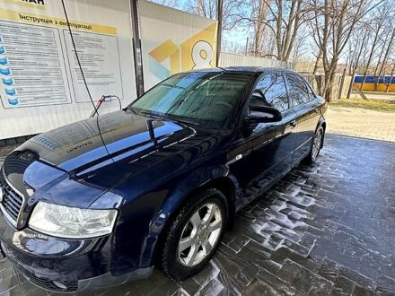 Синій Ауді А4, об'ємом двигуна 1.6 л та пробігом 230 тис. км за 4400 $, фото 1 на Automoto.ua