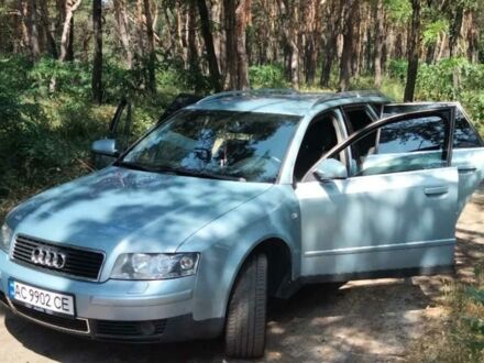Синий Ауди А4, объемом двигателя 2.5 л и пробегом 293 тыс. км за 7000 $, фото 1 на Automoto.ua