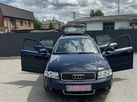 Синий Ауди А4, объемом двигателя 2 л и пробегом 320 тыс. км за 5800 $, фото 1 на Automoto.ua