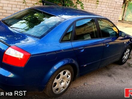 Синий Ауди А4, объемом двигателя 2 л и пробегом 258 тыс. км за 5500 $, фото 1 на Automoto.ua