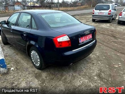 Синий Ауди А4, объемом двигателя 16 л и пробегом 240 тыс. км за 5600 $, фото 1 на Automoto.ua