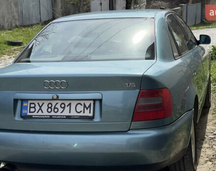 Зеленый Ауди А4, объемом двигателя 1.78 л и пробегом 244 тыс. км за 5500 $, фото 13 на Automoto.ua