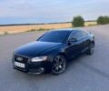 Черный Ауди А5, объемом двигателя 2 л и пробегом 235 тыс. км за 8799 $, фото 1 на Automoto.ua