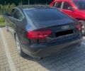 Черный Ауди А5, объемом двигателя 1.98 л и пробегом 233 тыс. км за 14000 $, фото 1 на Automoto.ua