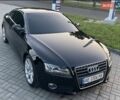 Черный Ауди А5, объемом двигателя 1.8 л и пробегом 197 тыс. км за 11750 $, фото 1 на Automoto.ua