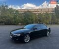 Черный Ауди А5, объемом двигателя 2 л и пробегом 203 тыс. км за 11850 $, фото 1 на Automoto.ua