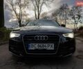 Черный Ауди А5, объемом двигателя 1.98 л и пробегом 197 тыс. км за 9300 $, фото 1 на Automoto.ua