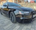 Черный Ауди А5, объемом двигателя 1.98 л и пробегом 90 тыс. км за 16500 $, фото 1 на Automoto.ua