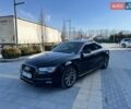 Черный Ауди А5, объемом двигателя 1.98 л и пробегом 157 тыс. км за 11400 $, фото 1 на Automoto.ua