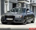 Сірий Ауді A5, об'ємом двигуна 2 л та пробігом 215 тис. км за 11999 $, фото 1 на Automoto.ua
