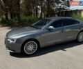 Серый Ауди А5, объемом двигателя 1.8 л и пробегом 283 тыс. км за 9350 $, фото 1 на Automoto.ua