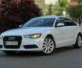Белый Ауди А6, объемом двигателя 1.98 л и пробегом 200 тыс. км за 12499 $, фото 1 на Automoto.ua