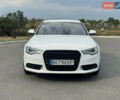 Білий Ауді А6, об'ємом двигуна 2 л та пробігом 212 тис. км за 11799 $, фото 1 на Automoto.ua