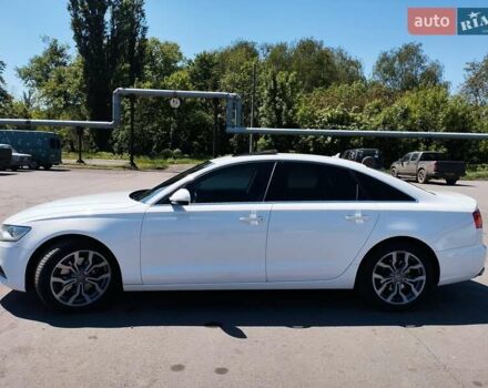 Белый Ауди А6, объемом двигателя 1.98 л и пробегом 186 тыс. км за 12000 $, фото 1 на Automoto.ua