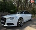 Белый Ауди А6, объемом двигателя 2 л и пробегом 215 тыс. км за 12699 $, фото 1 на Automoto.ua