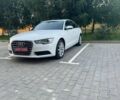 Білий Ауді А6, об'ємом двигуна 1.98 л та пробігом 263 тис. км за 12800 $, фото 1 на Automoto.ua