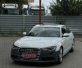 Білий Ауді А6, об'ємом двигуна 2 л та пробігом 242 тис. км за 11500 $, фото 1 на Automoto.ua