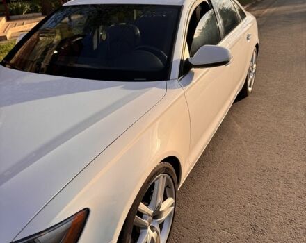 Белый Ауди А6, объемом двигателя 2 л и пробегом 200 тыс. км за 12400 $, фото 1 на Automoto.ua