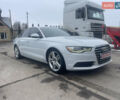 Белый Ауди А6, объемом двигателя 2 л и пробегом 220 тыс. км за 14200 $, фото 1 на Automoto.ua