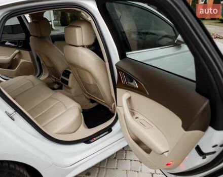 Білий Ауді А6, об'ємом двигуна 1.98 л та пробігом 216 тис. км за 19000 $, фото 35 на Automoto.ua