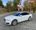 Білий Ауді А6, об'ємом двигуна 2 л та пробігом 143 тис. км за 19900 $, фото 1 на Automoto.ua