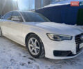 Белый Ауди А6, объемом двигателя 1.97 л и пробегом 225 тыс. км за 17700 $, фото 1 на Automoto.ua