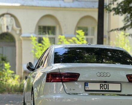 Белый Ауди А6, объемом двигателя 2 л и пробегом 117 тыс. км за 18699 $, фото 3 на Automoto.ua