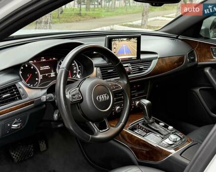 Белый Ауди А6, объемом двигателя 1.98 л и пробегом 135 тыс. км за 19300 $, фото 25 на Automoto.ua